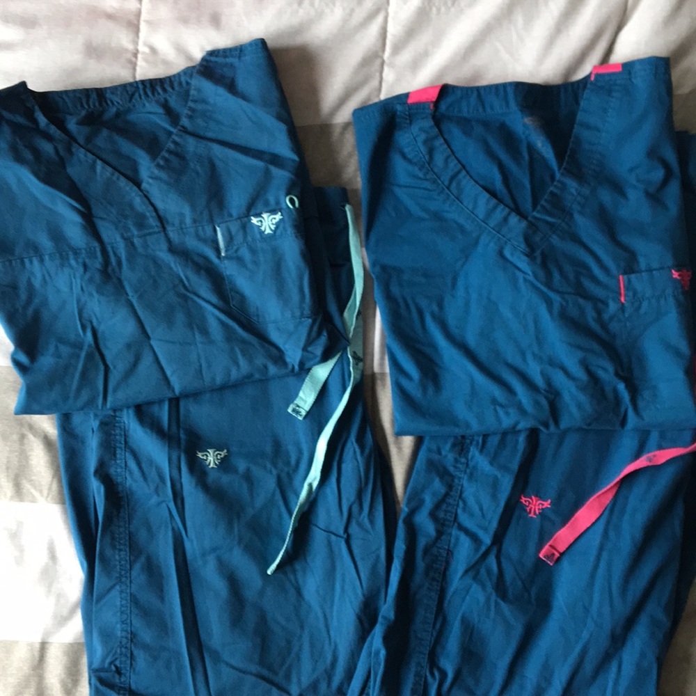 2 pair med couture scrubs
